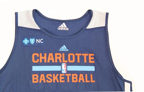 Charlotte Bobcats publicité sur maillot