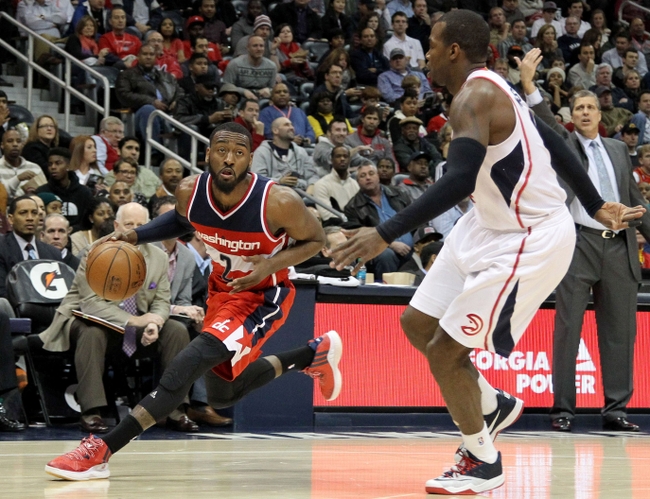 Jan 11, 2015; Atlanta, GA, USA; Washington Wizards guard John Wall (2) drives to the basket against the Atlanta Hawks in the second quarter at Philips Arena. Mandatory Credit: Brett Davis-USA TODAY Sports