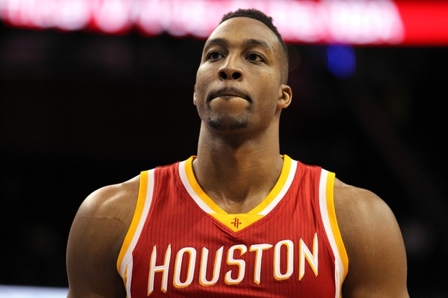 Jan 14, 2015; Orlando, FL, USA; Houston Rockets center Dwight Howard (12) reacts during the fourth quarter  at Amway Center. Orlando Magic defeated the Houston Rockets 120-113. Mandatory Credit: Kim Klement-USA TODAY Sports