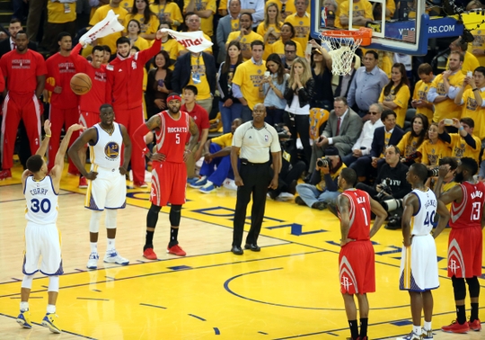 May 19, 2015; Oakland, CA, USA; Golden State Warriors guard Stephen Curry (30) shoots a free throw against the Houston Rockets in the second half in game one of the Western Conference Finals of the NBA Playoffs at Oracle Arena. Mandatory Credit: Kelley L Cox-USA TODAY Sports