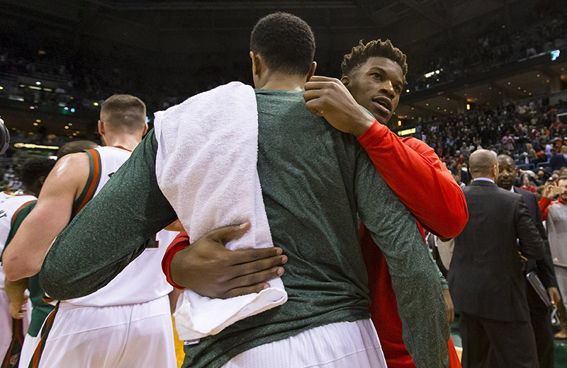 Apr 30, 2015; Milwaukee, WI, USA; Chicago Bulls guard Jimmy Butler (21) greets Milwaukee Bucks players following game six of the first round of the NBA Playoffs. at BMO Harris Bradley Center.  Chicago won 120-66.  Mandatory Credit: Jeff Hanisch-USA TODAY Sports