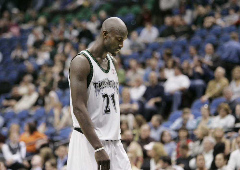 Minnesota Timberwolves' Kevin Garnett walks down court in the waning seconds of the Timberwolves 114-106 loss to the Seattle SuperSonics after the Timberwolves blew a 25 point lead in the third quarter of an NBA basketball game Tuesday, March 27, 2007 in Minneapolis. Garnett scored 20 points. (AP Photo/Jim Mone) ORG XMIT: MNJM110