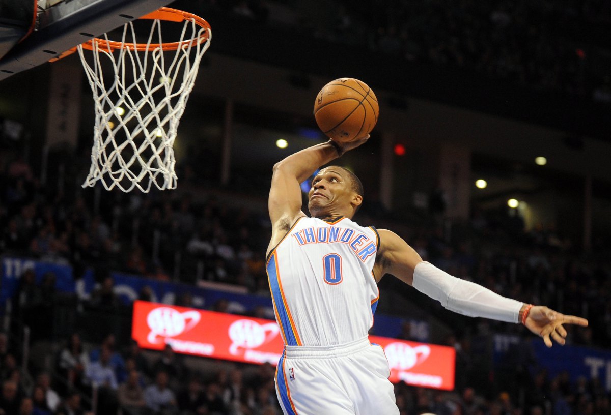 Jan 16, 2015; Oklahoma City, OK, USA;  Oklahoma City Thunder guard Russell Westbrook (0) dunks the ball against the Golden State Warriors during the fourth quarter at Chesapeake Energy Arena. Mandatory Credit: Mark D. Smith-USA TODAY Sports ORG XMIT: USATSI-187418 ORIG FILE ID:  20150116_pjc_ax3_322.JPG