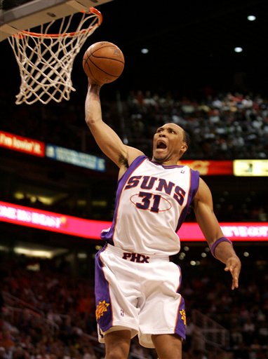 ** FILE ** Phoenix Suns forward Shawn Marion scores two of his game-high 33 points against the Denver Nuggets in the fourth quarter of an NBA basketball game in Phoenix, in this March 30, 2007 file photo. (AP Photo/Rick Scuteri)