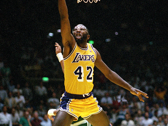 ** FILE ** Los Angeles Lakers' James Worthy goes up for a basket against the Boston Celtics in the NBA finals at The Forum in Inglewood, Ca., in this June 3, 1987 photo. Worthy and Robert Parish led a group of seven players, coaches and broadcasters elected Monday, April 7, 2003  to the Naismith Memorial Basketball Hall of Fame.(AP Photo/Lennox Mclendon) ORG XMIT: NY158