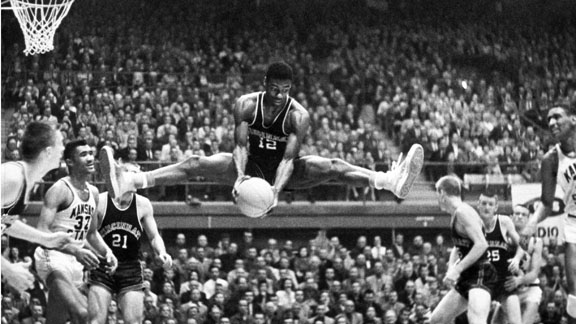 Oscar Robertson #12 of the Cincinnati Bearcats pulls in the rebound against the Kansas State University Wildcats, circa 1958-60. (Photo by Collegiate Images, LLC/WireImage)