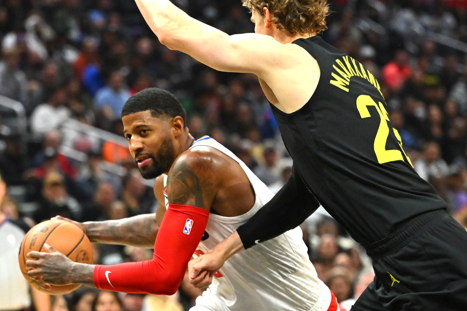 Paul George et Lauri Markkanen